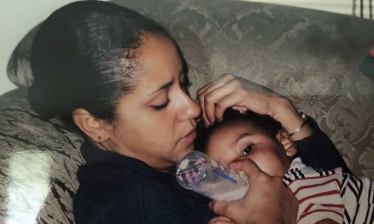 An early picture of Julian Broadus with his mother Laurie Holmond. 